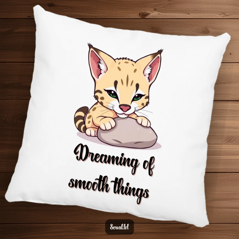 Funny serval pillow showing a serval playfully nudging a smooth pebble with its nose, designed for comfort and gentle amusement.