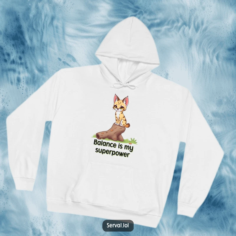 Funny serval hoodie showing a serval with a focused gaze, delicately balancing on a fallen log, embodying feline grace and concentration.