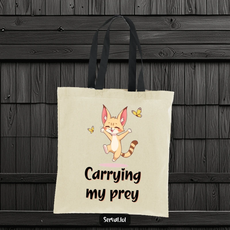 Funny tote bag illustrating a kawaii serval character mid-leap, playfully chasing a fluttering butterfly, perfect for everyday use.
